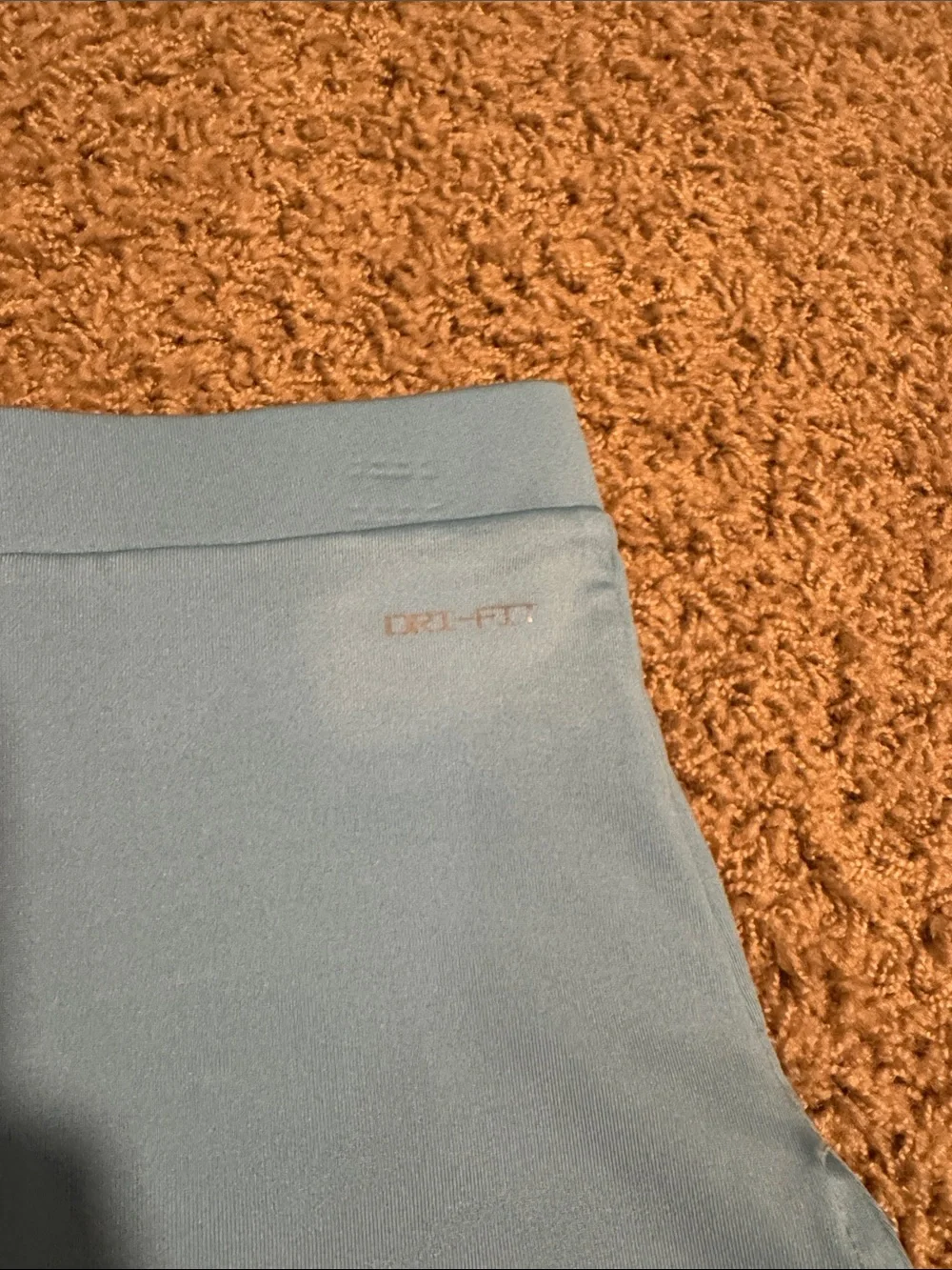 Nike Light Blue Girls' Athletic Skort with Pink Swoosh